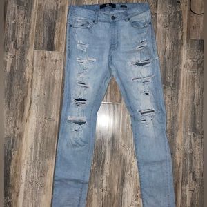 Light washed blue ripped jeans